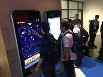 Facebook Tour - Students in Facebooks game room